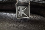 KAWOLA Relaxsessel JOSIANE Drehsessel Lederfaserstoff schwarz mit Hocker
